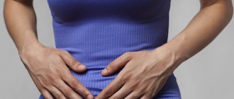 Woman holding her stomach